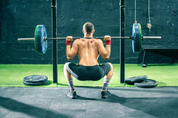 How do I squat at the gym?